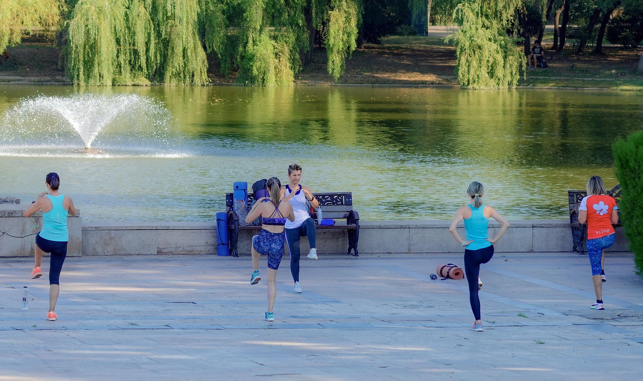 people, exercising, recreation, girls, gym, sports, outdoors, pavement, naturally, lake, instructor, summer, health, street, nature, park